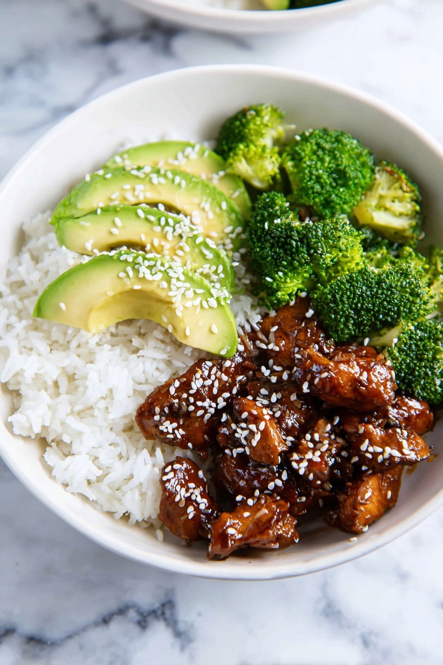 A white bowl with three main layers: the bottom layer is white fluffy rice spread evenly, the middle layer has glossy, dark brown pieces of chicken coated in sauce and sprinkled with white sesame seeds, and the top layer has bright green steamed broccoli florets next to several thin slices of light green avocado also sprinkled with white sesame seeds. The bowl is set on a white marbled surface. Photo taken with an iphone --ar 2:3 --v 7
